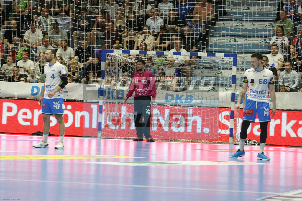 VFL Gummersbach -  FrischAuf Göppingen | Danierl Rebmann (lila Trikot)  - © Sportfoto-Sale (MK) - Realisiert mit Pictrs.com