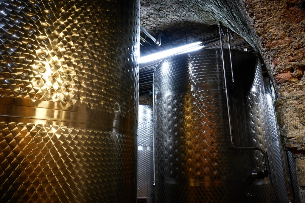 Stift Klosterneuburg | Niederösterreich, Austria - August 31, 2021; Stift Klosterneuburg; Edelstahltanks im Weinkeller. - Realisiert mit Pictrs.com