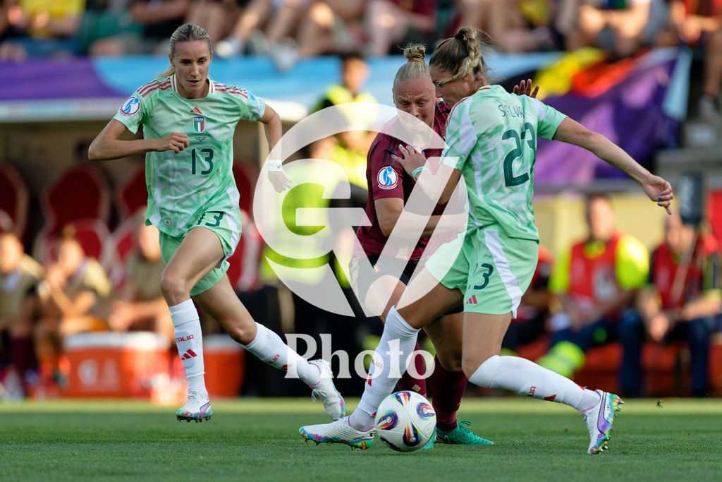 Belgium v Italy - UEFA Women's EURO 2025 Group B | SION, SWITZERLAND - JULY 3: Julie Piga of Italy (L) Ella Van Kerkhoven of Belgium (C) Cecilia Salvai of Italy (R) fight for possession during the UEFA Womens EURO 2025 Group B match between Belgium and Italy at Stade de Tourbillon on July 3, 2025 in Sion, Switzerland. (Photo by Giuseppe Velletri/Sports Press Photo/Getty Images)