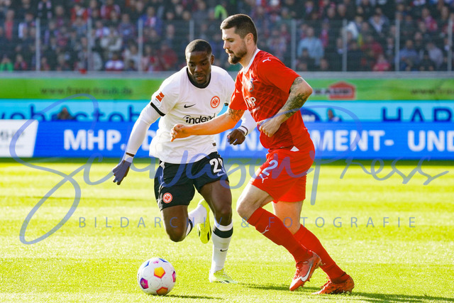 240224Ho390 | Niels Nkounkou (Eintracht Frankfurt), Marnon Busch (FC Heidenheim) - FC Heidenheim - Eintracht Frankfurt
Fussball Bundesliga, Saison 2023_24, 24. Spieltag, FC Heidenheim-Eintracht Frankfurt 
Deutschland, Heidenheim, Voith Arena, 02.03.2024

(DFL DFB REGULATIONS PROHIBIT ANY USE OF PHOTOGRAPHS as IAMGE SEQUENCES and or QUASI-VIDEO).

