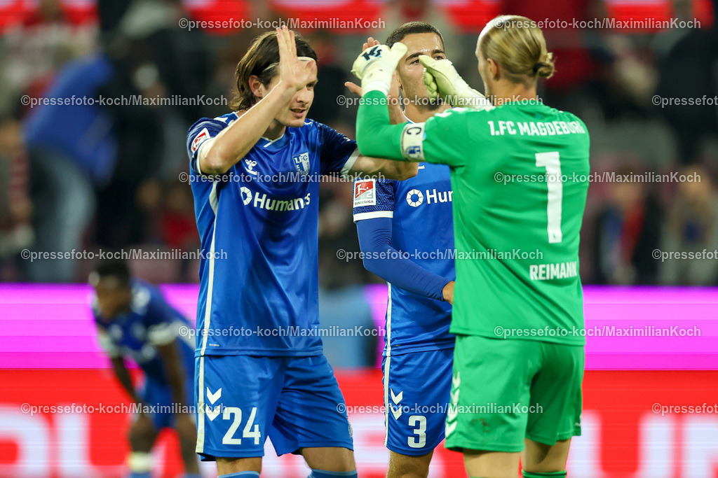 Koe14092402210 | 14.09.2024, 2. Fußball Bundesliga, 1. FC Köln - 1. FC Magdeburg, RheinEnergieSTADION, Saison 2024 2025: Freude nach dem 2:1 Sieg - Jean Hugonet (1.FC Magdeburg #24), Andi Hoti (1.FC Magdeburg #3) und Torwart Dominik Reimann (1.FC Magdeburg #1)DFB regulations prohibit any use of photographs as image sequences and or quasi-video.