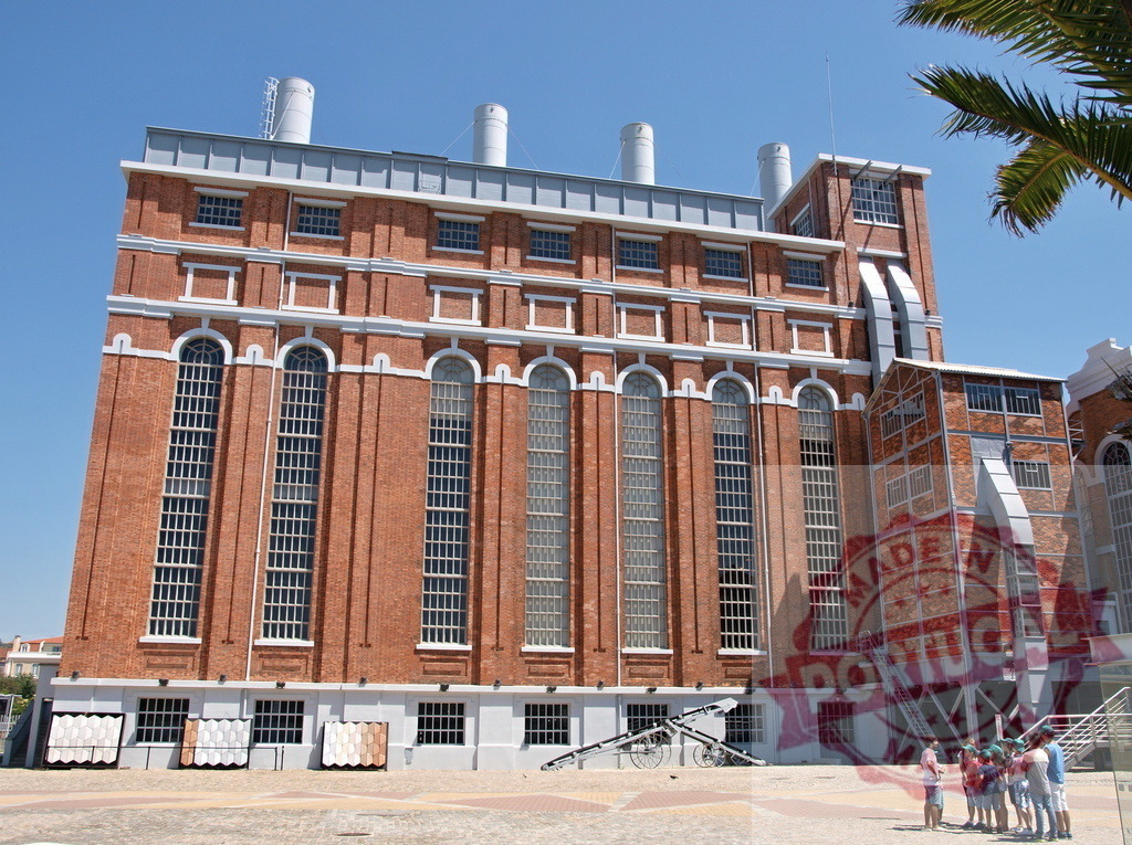 MAAT Tejo Power Station museum building in Lisbon. Lisbon - Portugal | Tejo Power Station, now a museum, standing under a clear blue sky in Lisbon - Realized with Pictrs.com