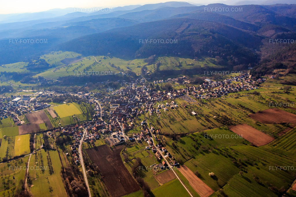 Aerial view: View of the town from the east in Lembach in the state Bas-Rhin, France.Photo: IMG_086686.jpg taken on 03/26/2016 by Werner Riehm/FLY-FOTO.comResolution of the original: 5289 x 3526 px