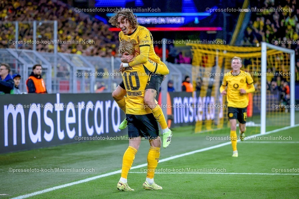 UCL10122501069 | 10.12.2025, Fußball, UEFA Champions League, Borussia Dortmund - FK Bodö/Glimt, BVB Stadion, 5. Spieltag, Saison 2025 2026: Torjubel nach dem Tor zum 1:0 durch Torschütze Julian Brandt (BVB #10)  zusammen mit Fabio Silva (BVB #21)   Regulations prohibit any use of photographs as image sequences and or quasi-video.