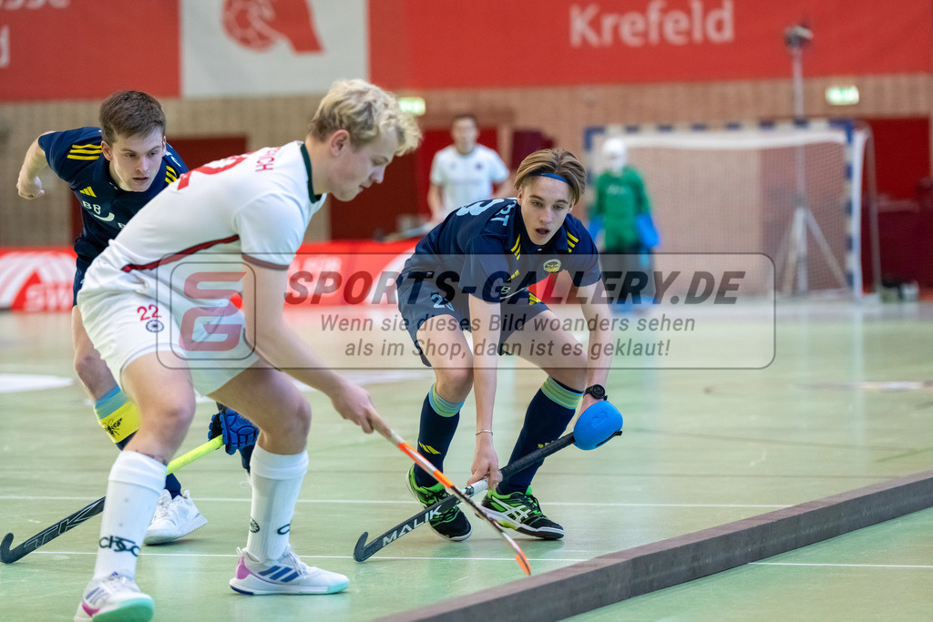 HK_20250118_101726 | 1/4 Finale 1. Bundesliga Halle Herren Crefelder HTC - Zehlendorfer Wespen am 18.1.2025 Halle Glockenspitz, Krefeld , Johann Wehnert ( Zehlendorfer Wespen #23) , LangHeinrich Finn ( Crefelder HTC #22 )