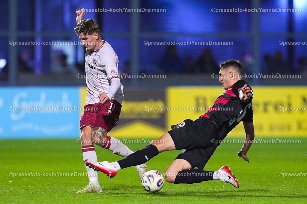 xYDR31102501054 | 31.10.2025, xydrx, Fußball, 3.Liga, FC Viktoria Köln - FC Ingolstadt 04, Saison 2025 2026, Sportpark Höhenberg: Frederik Christensen (FC Ingolstadt #11) im Zweikampf gegen Christoph Greger (FC Viktoria Köln #15)  DFB regulations prohibit any use of photographs as image sequences and or quasi-video.