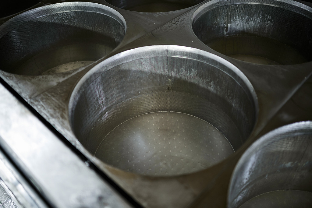 Sennerei Hittisau | Hittisau, Austria - July 29, 2019: Sennerei Hittisau, Blick in die Käsepresse. - Realisiert mit Pictrs.com