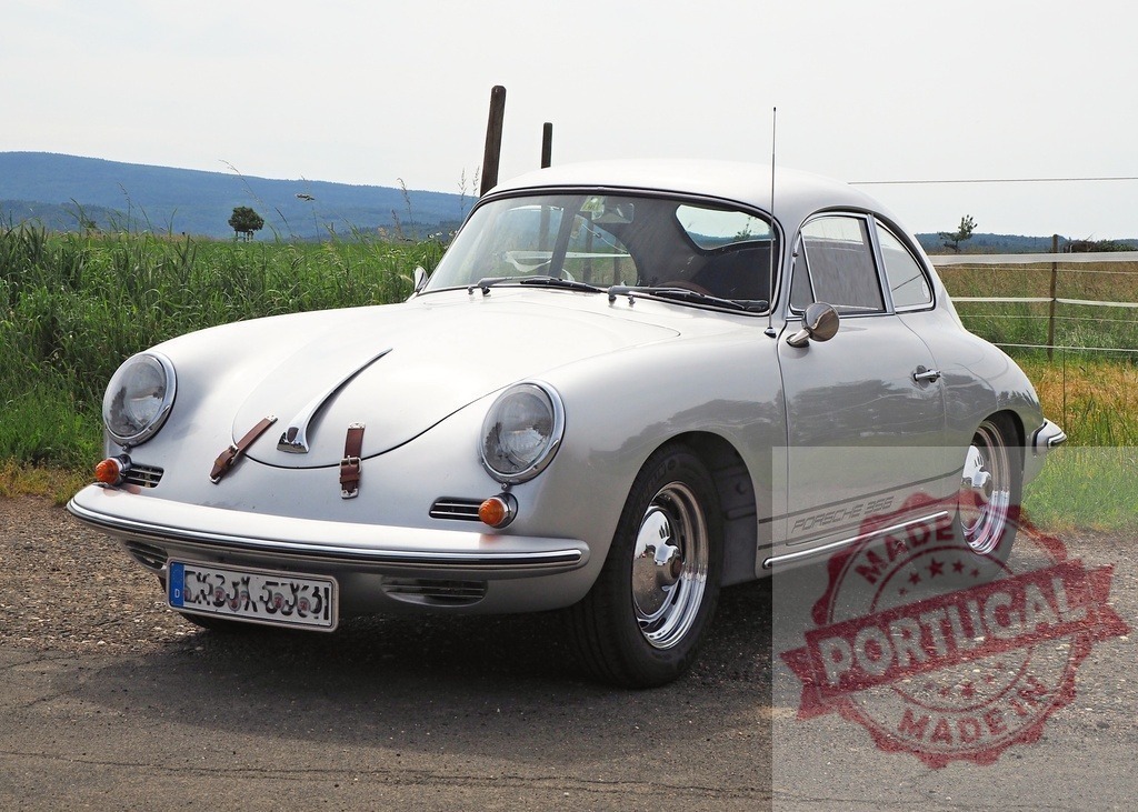 Silver Porsche 356 classic sports car outdoors | Silver Porsche 356 vintage coupe standing on a rural road with green fields - Realized with Pictrs.com