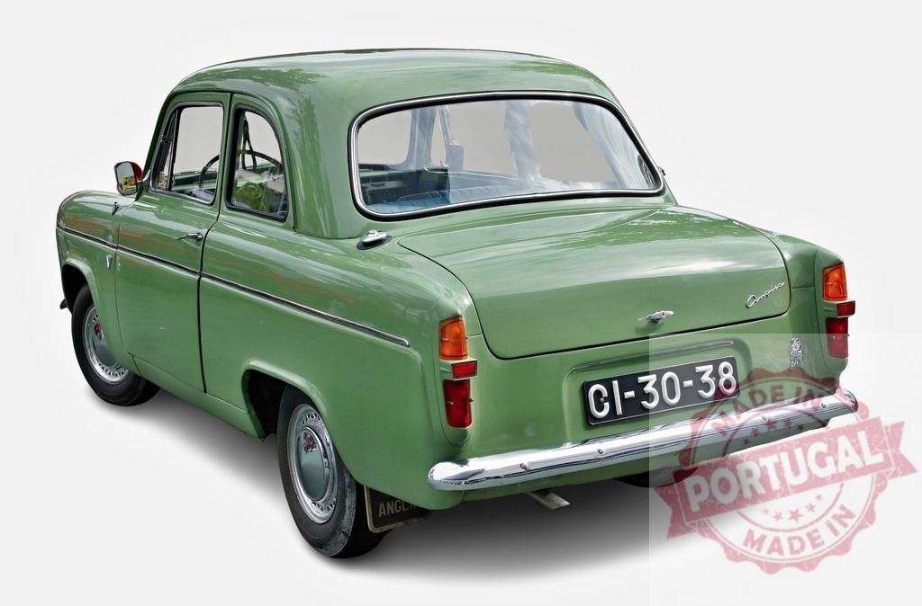 Green Ford Consul Classic Car Parked on White Background | Classic green Ford Consul car parked, showcasing its vintage design and timeless appeal - Realized with Pictrs.com