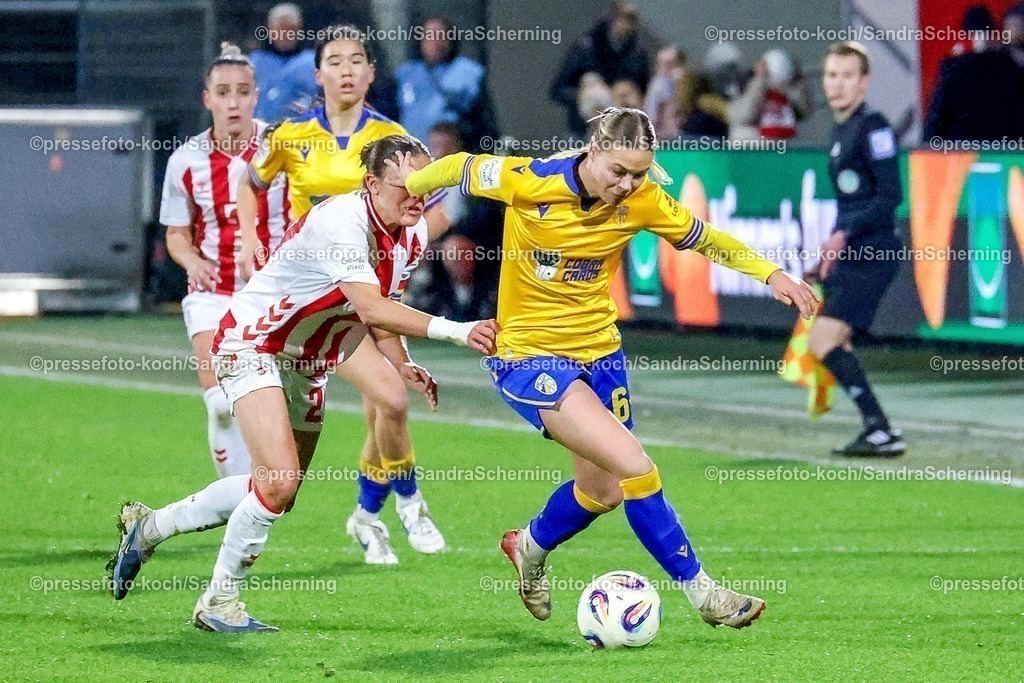 xSSCHx14122501032  | 14.12.2025, xsscx, Frauen Fussball, 1. FC Koeln - FC Carl Zeiss Jena, 1. Fussball Bundesliga, 13. Spieltag, Franz-Kremer-Stadion, Saison 2025 2026: Laura Feiersinger (1. FC Koeln #27) im Zweikampf gegen Nike Andersson (FC Carl Zeiss Jena #6) DFB regulations prohibit any use of photographs as image sequences and or quasi-video. Photo:xSandraxScherningxPressefotoKochx