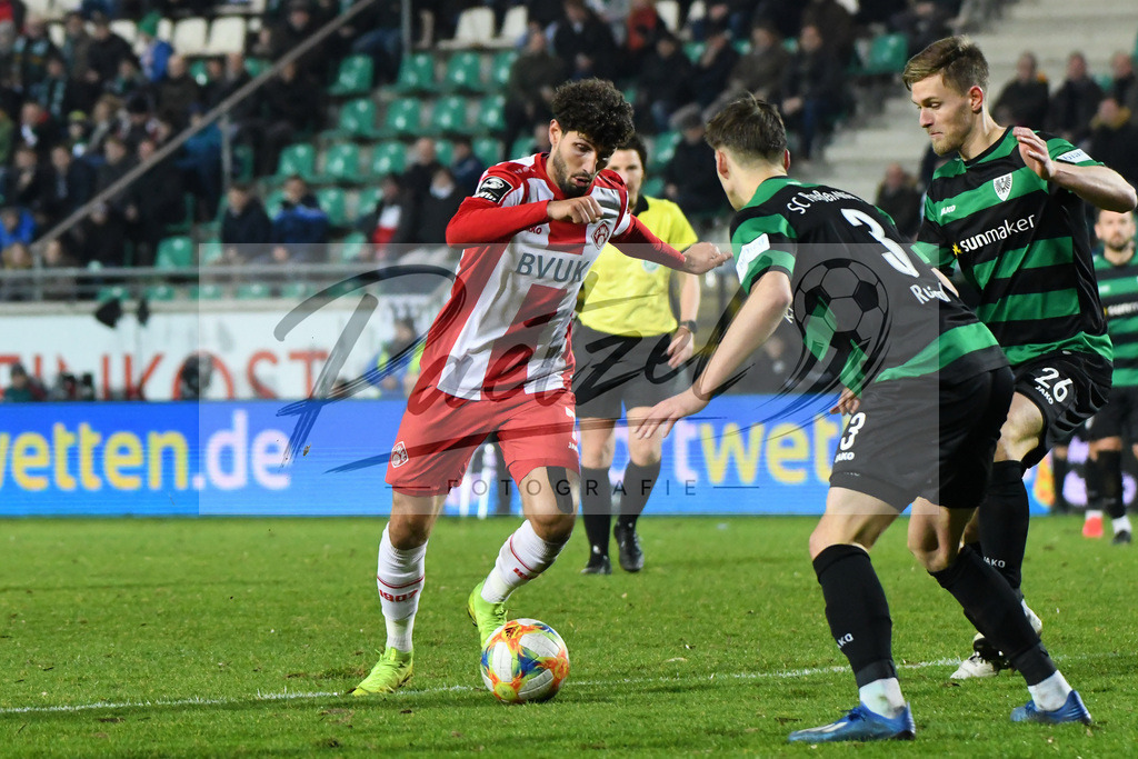 20200214_SCPFWK_0077 | Fussball, Herren: Fabio Kaufmann (FC Wuerzburger Kickers) und Oliver Steurer (SC Preussen Muenster) im Zweikampf waehrend des Spiels der 3. Liga zwischen SC Preussen Muenster und FC Wuerzburger Kickers im Preussenstadion am 14.02.2020 in Muenster, Deutschland.DFB / DFL REGULATIONS PROHIBIT ANY USE OF PHOTOGRAPHS AS IMAGE SEQUENCES AND/OR QUASI-VIDEO. - Realisiert mit Pictrs.com