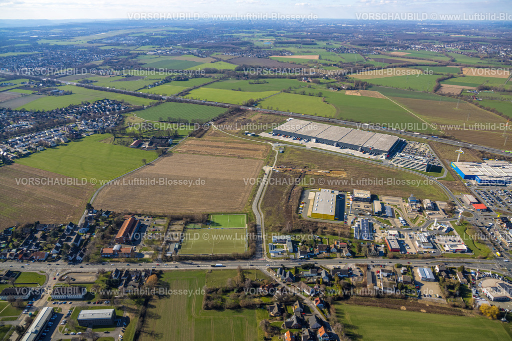 Unna230214168 | Luftbild, Gewerbegebiet Kamen Karree, Mönninghoffs Feld, Sportplatz SV Königsnorn, Afferde, Unna, Ruhrgebiet, Nordrhein-Westfalen, Deutschland