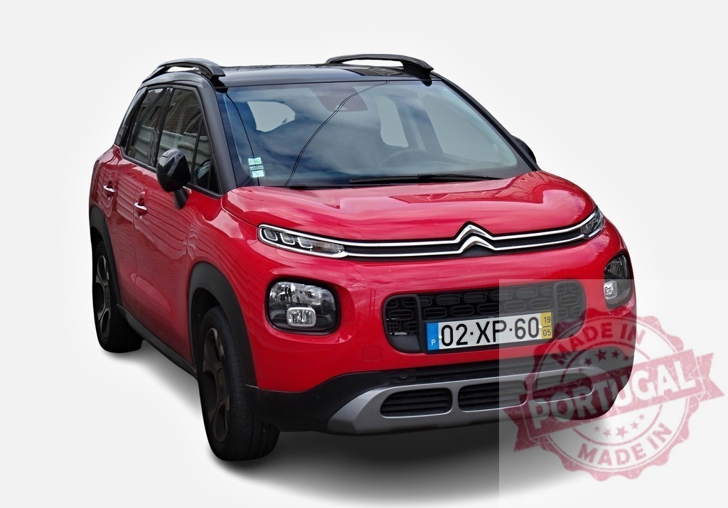 Red Citroën C3 Aircross showcasing modern car design | Modern red Citroën C3 Aircross, a compact SUV, parked against a white background, highlighting its sleek design and contemporary features - Realized with Pictrs.com