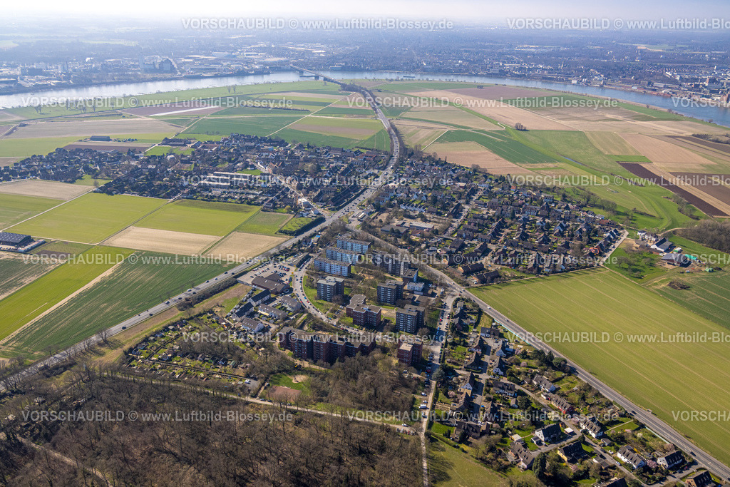 Duisburg240303156 | Luftbild, Hochhaus Wohnsiedlung Ortsteil Mündelheim und Friedhof, Krefelder Straße und Uerdinger Straße, Wiesen und Felder, hinten Fluss Rhein und Krefeld-Uerdinger Brücke, Mündelheim, Duisburg, Ruhrgebiet, Nordrhein-Westfalen, Deutschland, Duisburg-S
