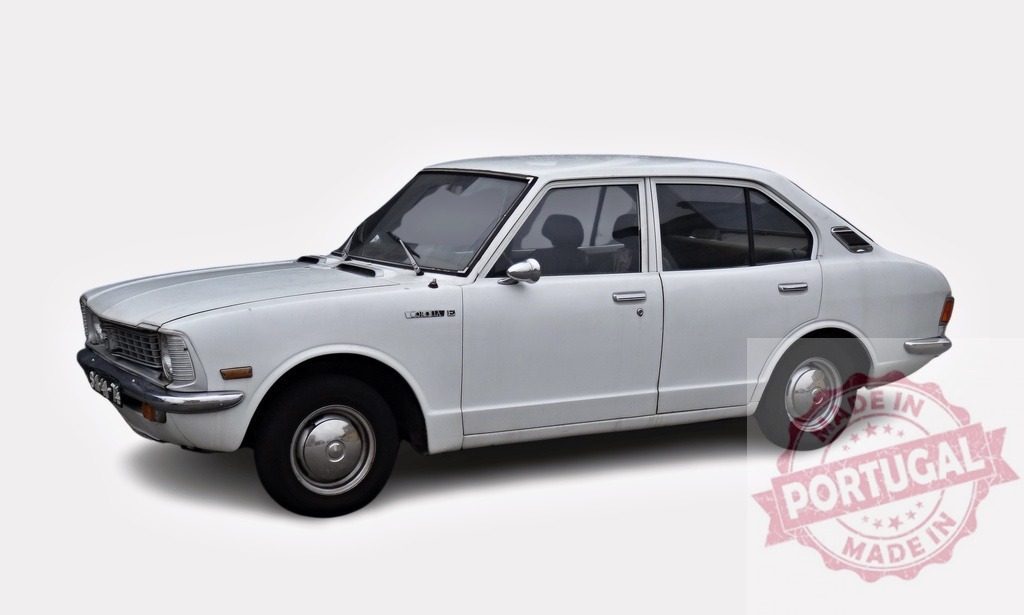 White Toyota Corolla parked, showing passenger door | Classic white Toyota Corolla from the 70s parked against white background - Realized with Pictrs.com