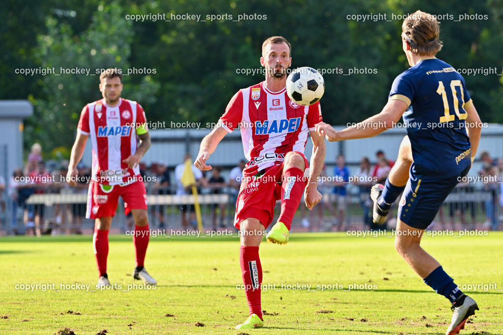 ATUS Velden vs. GAK | #5 Petar Filipovic GAK, #10 Lukas Lausegger ATUS Velden, ATUS Velden vs. GAK, ATUS Velden vs. GAK am 26.07.2024 in Villach (Stadion Lind), Austria, (Photo by Bernd Stefan)