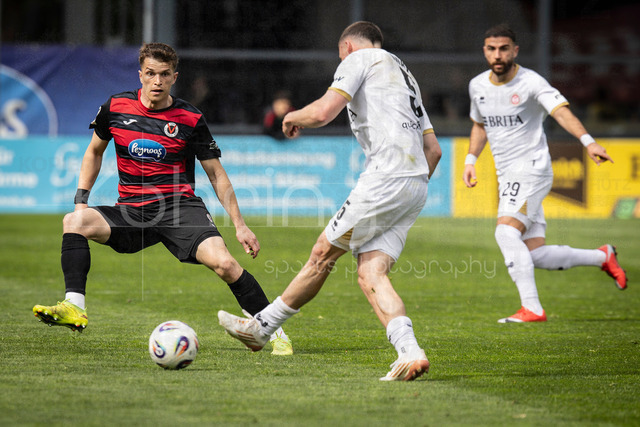 Viktoria Koeln vs. SV Wehen Wiesbaden, 11.04.2026 | KOELN, GERMANY - APRIL 11, 2026:  David Otto (Viktoria Köln, 10), Niklas May (SV Wehen Wiesbaden, 5), Fatih Kaya (SV Wehen Wiesbaden, 29)  during the 3rd division match between Viktoria Koeln vs. SV Wehen Wiesbaden at the Sportpark Hoehenberg on matchday 7 on April 11, 2026 in Koeln, Germany. DFL REGULATIONS PROHIBIT ANY USE OF PHOTOGRAPHS AS IMAGE SEQUENCES AND/OR QUASI-VIDEO.