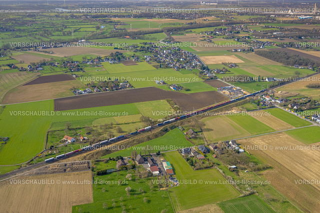 Voerde240309365 | Luftbild, Brücke Grenzstraße Baustelle mit Ausbau der Betuweroute und Betuwe-Linie Eisenbahnstrecke, Güterzug und Wiesen und Felder, Stockum, Voerde, Nordrhein-Westfalen, Deutschland