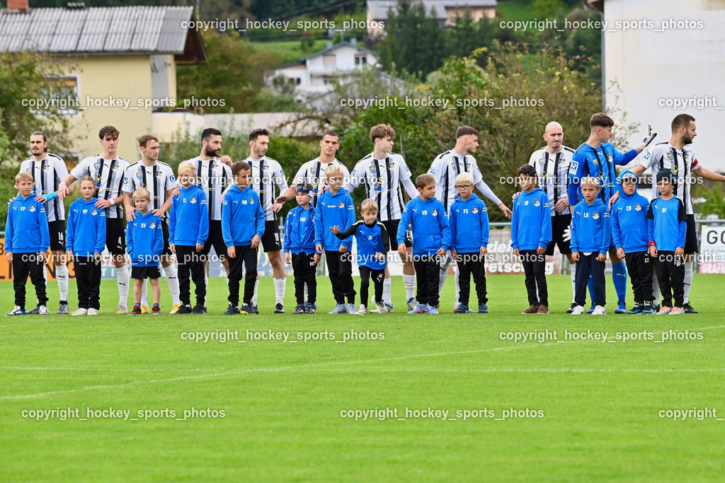SVG Bleiburg vs. SAK 23.9.2023 | SVG Bleiburg Mannschaft, SVG Bleiburg Einlauf mit Nachwuchs, SVG Bleiburg vs. SAK 23.9.2023, SVG Bleiburg vs. SAK am 23.09.2023 in Bleiburg (Karl Kornberger Stadion), Austria, (Photo by Bernd Stefan)