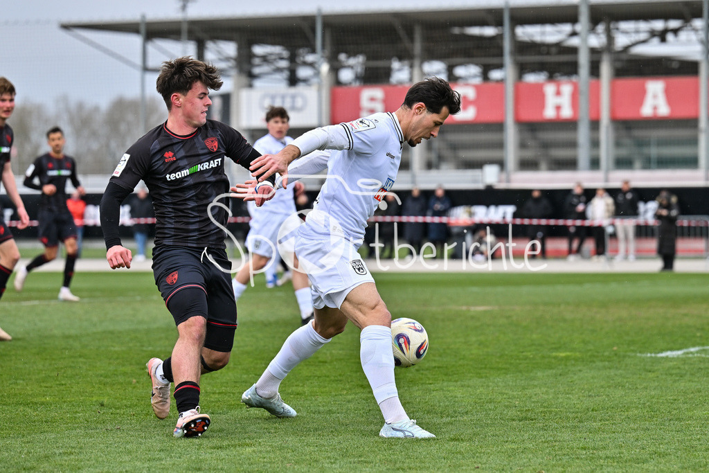 FC Ingolstadt - SSV Ulm 1846 Fussball  | INGOLSTADT, GERMANY - 25. MAERZ: im Duell Timo HENGMITH (FC Ingolstadt 41) und Lukas MAZAGG (SSV Ulm 27) während dem Testspiel zwischen dem FC Ingolstadt und dem SSV Ulm 1846 Fussball auf Platz 4 am Audi Sportpark