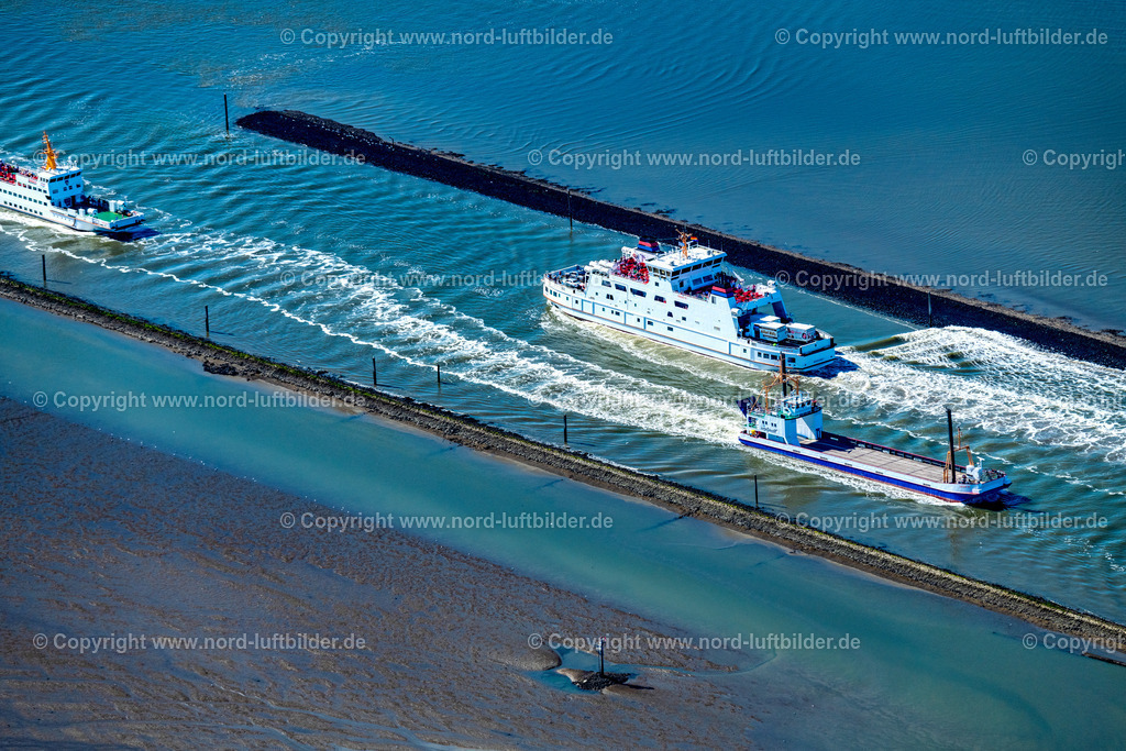Norddeich_Fähren_Frisia_Iv_Inselfracht_ELS_7385050923 | NORDEN 05.09.2023 Fahrt eines Fähr- Schiffes der AG Reederei Norden-Frisia Schiff " Frisia 4 " und der Lastfähre " Inselfracht " in Norden Norddeich im Bundesland Niedersachsen, Deutschland. Weiterführende Informationen bei: Reederei Norden-Frisia AG. // Journey of a ferry ship of the AG Reederei Norden-Frisia ship "Frisia 4" and the cargo ferry "Inselfreight" in Norden Norddeich in the state Lower Saxony, Germany. Further information at: Reederei Norden-Frisia AG. Foto: Martin Elsen
