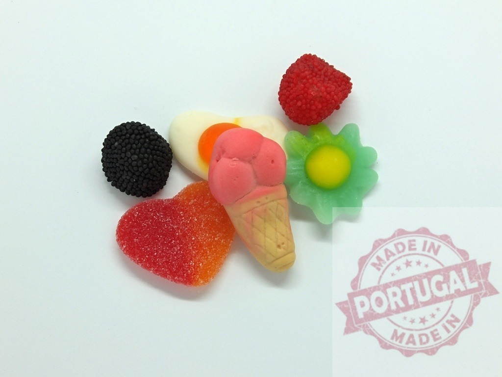 Colorful candy gummies forming a delicious sweet assortment | Assortment of colorful gummy candies creating a sweet and appealing display - Realized with Pictrs.com
