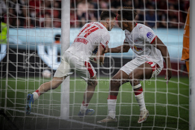 German Bundesliga, Bayer 04 Leverkusen vs. RB Leipzig, 02.05.2026 | LEVERKUSEN, GERMANY - MAY 2, 2026 :  Christoph Baumgartner (RB Leipzig, 14) shoots a goal and saves the ball during the German Bundesliga match on gameday 32 between Bayer 04 Leverkusen vs. RB Leipzig at BayArena on May 2, 2026 in Leverkusen, Germany. DFL REGULATIONS PROHIBIT ANY USE OF PHOTOGRAPHS AS IMAGE SEQUENCES AND/OR QUASI-VIDEO.