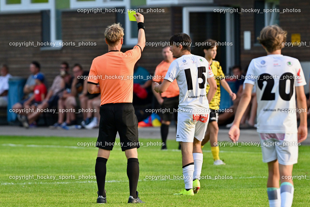 FC Faakersee vs. Rapid Lienz  | Paul Fischer Referee, #15 Samuel Becciu Rapid Lienz, Gelbe Karte, #20 Valentin Christian Dorer Rapid Lienz, FC Faakersee vs. Rapid Lienz , FC Faakersee vs. Rapid Lienz  am 04.08.2024 in Faakersee (Sportplatz Faakersee), Austria, (Photo by Bernd Stefan)