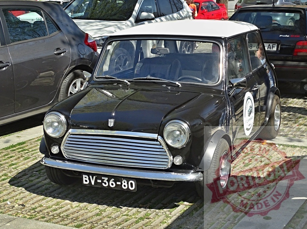 Classic black Mini Cooper car parking space | Mini Cooper car parked on textured paving demonstrating vintage automotive style - Realized with Pictrs.com