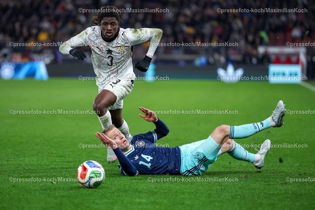 DFB30032600081 | 30.03.2026, Fußball, Länderspiel, Deutschland - Ghana, MHP-Arena (Stuttgart), Saison 2025 2026: Caleb Yirenkyi (Ghana #3) im Zweikampf gegen  Chris Führich (GER #14)  DFB regulations prohibit any use of photographs as image sequences and or quasi-video.