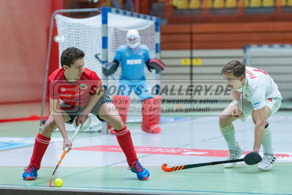 HK_20230122_103255 | 1. Bundesliga ( Halle ) Herren Crefelder HTC - Rot-Weiss Köln am 22.1.2023 Crefelder HTC  ( CHTC ) Halle Glockenspitz , Krefeld , Kemmerich Peer ( Crefelder HTC #21 ) , Aron Flatten ( Rot-Weiss Köln #6 )