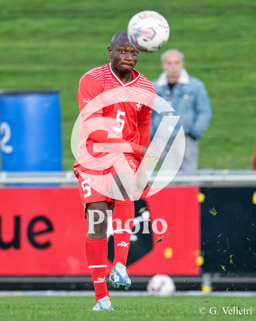 UEFA Region's Cup - Vaud v Munster | Lamine Camara Mamadou (5 Vaud) shoots the ball (action) during the UEFA Region's Cup game between Vaud and Munster at Centre Sportif de Colovray in Nyon, Switzerland 