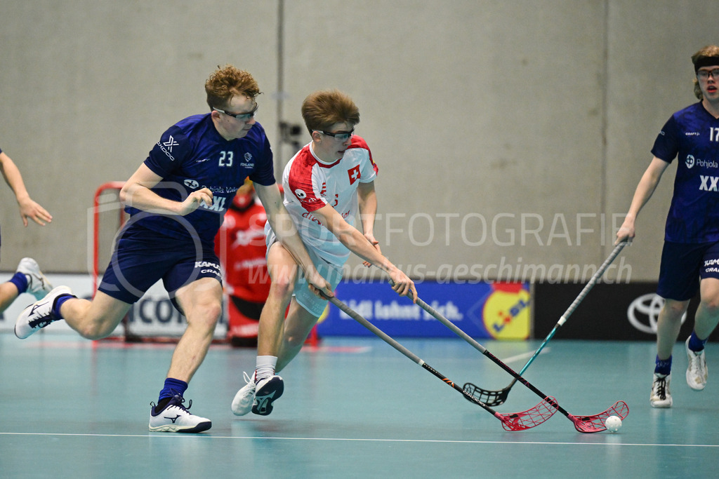 Switzerland U19 vs Finland U19 - 3. February 2024 | Switzerland U19 vs Finland U19
U19 Men International Matches in Switzerland
GoEasy Arena, Siggenthal Station
Finland defender #23 Jami Markkanen tackling Switzerland forward #5 Severin Schmid.
Credit: Markus Aeschimann | <a href="https://www.markus-aeschimann.ch">Sportfotografie Markus Aeschimann</a> | <a href="https://www.instagram.com/sportfotografie.aeschimann">@sportfotografie.aeschimann</a> - Realisiert mit Pictrs.com
