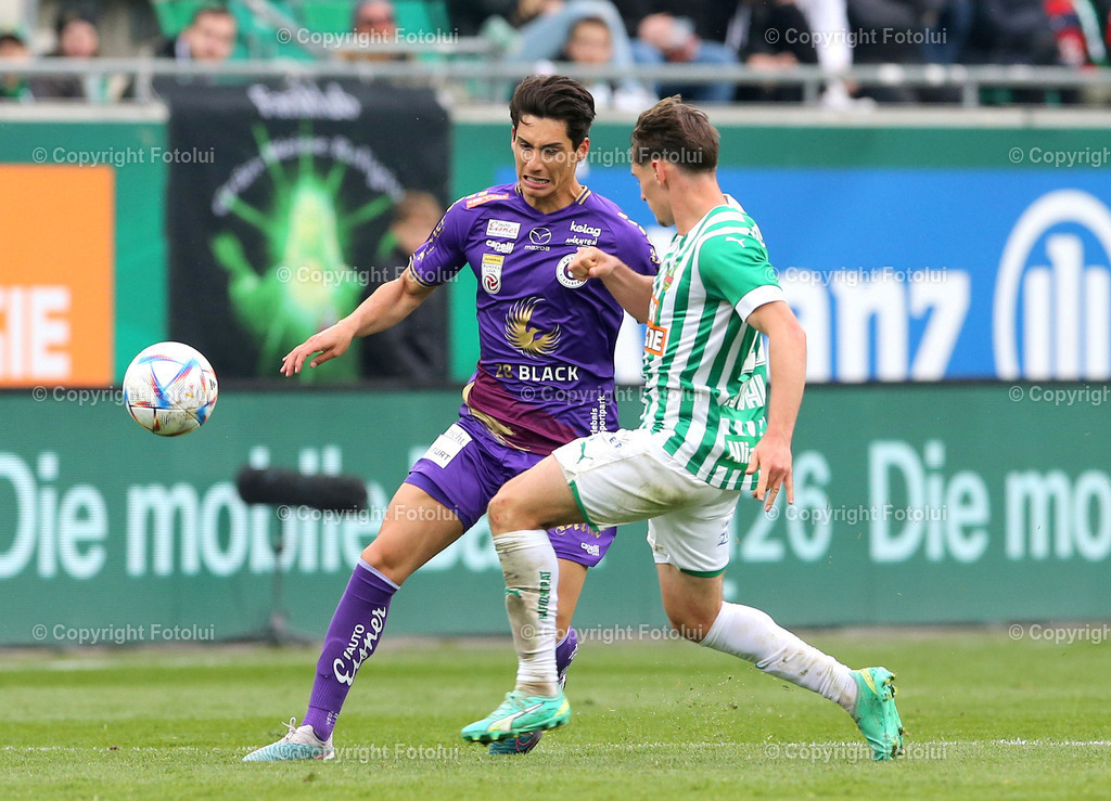 A_LUI_09042023_06 | SPORT,FUSSBALL,ADMIRAL BUNDESLIGA SK RAPID WIEN- AUSTRIA KLAGENFURT 09.04.2023 IM BILD: SEBASTIAN GUERRA SOTO  (KLAGENFURT) UND NICOLAS GERITT KUEHN (SK RAPID WIEN ) FOTO:FOTOLUI/MW