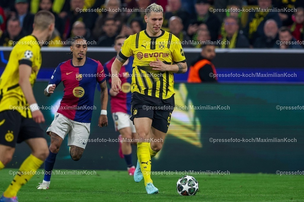 UCL1504251162 | 15.04.2025, Fußball, UEFA Champions League, Borussia Dortmund - FC Barcelona, BVB Stadion, Viertelfinale, Saison 2024 2025: Niklas Süle (BVB #25) Regulations prohibit any use of photographs as image sequences and or quasi-video.