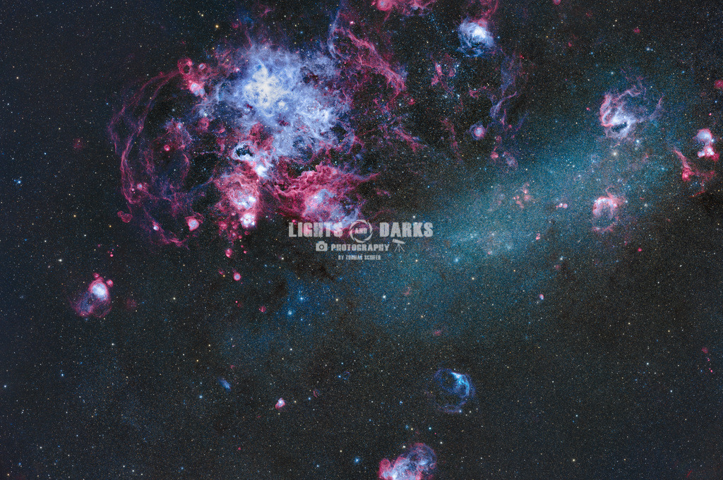 Tarantula | The Tarantula Nebula (also known as 30 Doradus or NGC 2070) is a large emission nebula in the Large Magellanic Cloud (LMC), forming its south-east corner (from Earth's perspective). For those who don`t know ... the LMC is a not so well known neighbouring galaxy to our milkyway. That means, this nebula is not in the milkyway. It`s one of the biggest and most active starburst region known in the Local Group of galaxies. Most of you may know the famous Orion Nebula (M42) which is one of the closest starburst regions to earth. To give you a hint how large the Tarantula Nebula is: Would it be at the same distance to earth as the Orion Nebula it would span across half of the night sky and i would never be dark if it shows up.
The LMC is only visible from the Southern hemisphere. Shot from Kiripotib in Namibia! - Realisiert mit Pictrs.com