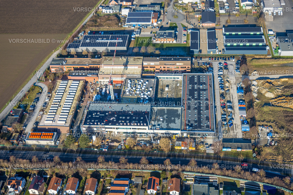 Soest260104139 | Luftbild, Gewerbegebiet mit Baustelle, Ostinghauser Landstraße und Schleswiger Ring, Umbau und Renovierung Bildungszentrum BBZ Hellweg Lippe e.V., Walburger, Soest, Südwestfalen, Nordrhein-Westfalen, Deutschland