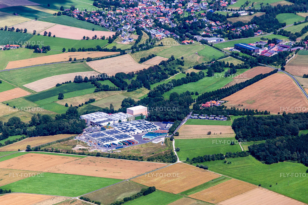 MineralBrunnen RhönSprudel Egon Schindel GmbH http://www.rhoensprudel.de/ | Luftbild: MineralBrunnen RhönSprudel Egon Schindel GmbH http://www.rhoensprudel.de/ im Ortsteil Memlos in Eichenzell im Bundesland Hessen in Deutschland. Foto: IMG_141985.jpg vom 07.07.2024 durch ©2025 Werner Riehm fly-foto.de/copyright - Realisiert mit Pictrs.com