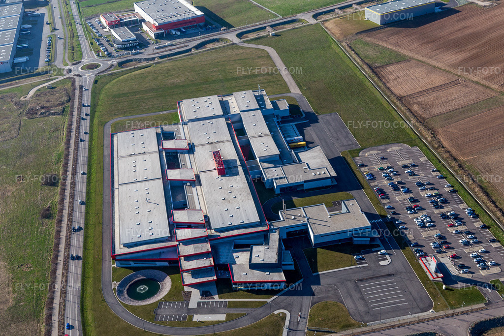 Aerial view: SEW-USOCOME factory premises in Brumath in Bernolsheim in Mommenheim in the state Bas-Rhin, France. – Photo: IMG_097639.jpg taken on 03/16/2017 by Werner Riehm/FLY-FOTO.com – Resolution of the original: 5472 x 3648 px