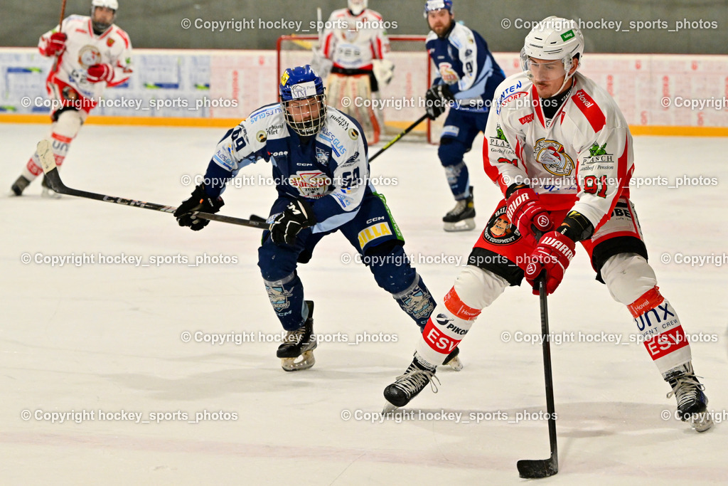 ESV FERLACH vs. ESC SOCCERZONE STEINDORF | #69 Kreuzer Philipp ESC Steindorf, #91 Alagic Adis ESV Ferlach, ESV FERLACH vs. ESC SOCCERZONE STEINDORF, ESV FERLACH vs. ESC SOCCERZONE STEINDORF am 22.11.2024 in Ferlach (Eishalle Ferlach ), Austria, (Photo by Bernd Stefan)