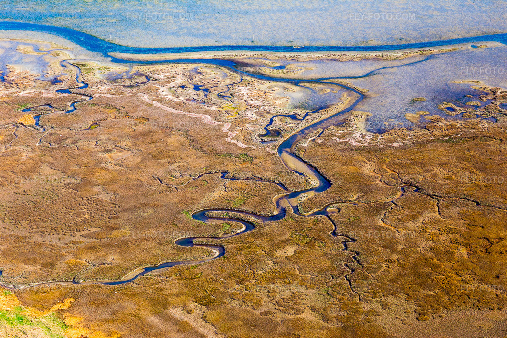 Aerial view: Brackish water landscape on Isola Marinetta in Lido di Grado near Lignano Sabbiadoro in Lignano Sabbiadoro in the state Udine, Italy.Photo: IMG_098042.jpg taken on 04/03/2017 by Werner Riehm/FLY-FOTO.comResolution of the original: 5472 x 3648 px