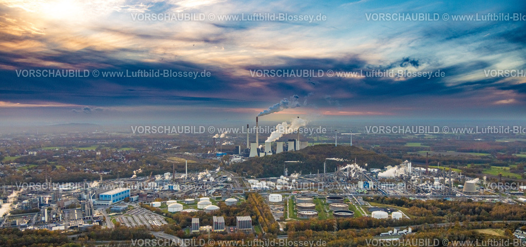 Gelsenkirchen231103380-3 | Luftbild, dampfender Kühlturm und Schornstein der Uniper Kraftwerke GmbH und das Ruhr Oel Werksgelände, dramatischer Himmel mit Wolken, umgeben von herbstlichen Laubbäumen, Scholven, Gelsenkirchen, Ruhrgebiet, Nordrhein-Westfalen, Deutschland