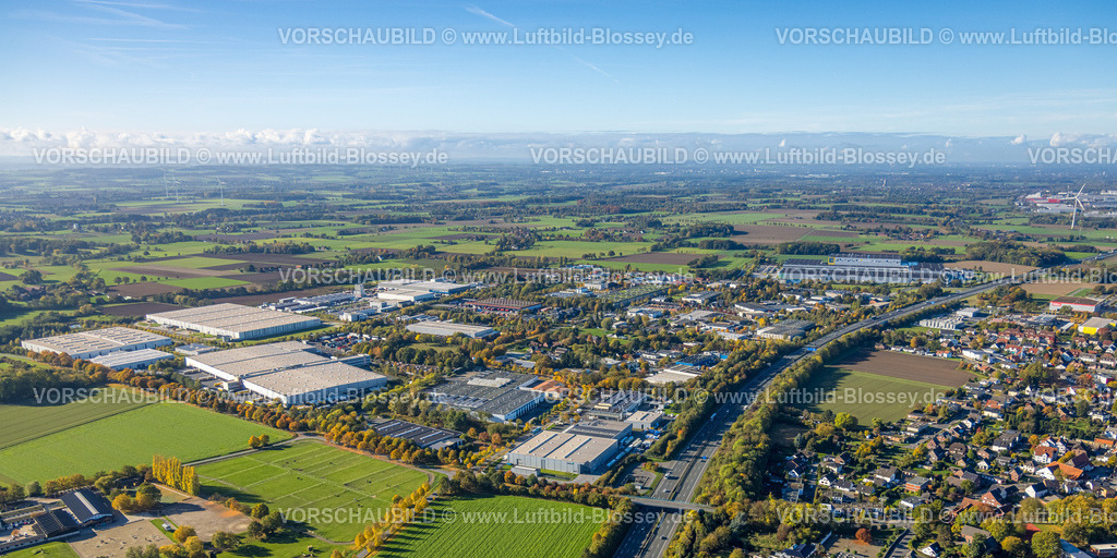 Hamm251001723 | Luftbild, Gewerbegebiet Oberster Kamp an der Autobahn A2, Wiesen und Felder mit Fernsicht, Brücke Wambelner Straße über die Autobahn,hinten das EDEKA Zentrallager Hamm, Stadtbezirk Rhynern, Hamm, Ruhrgebiet, Nordrhein-Westfalen, Deutschland