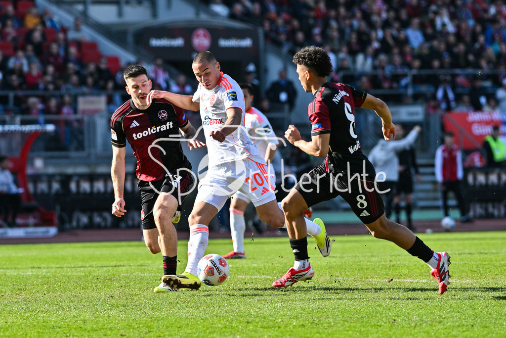 1. FC Nürnberg - Fortuna Düsseldorf | NUREMBERG, GERMANY - 07. MARCH:  im Duell Ondrej KARAFIAT (1. FC Nuernberg 44) und Marin LJUBICIC (Fortuna Düsseldorf 20) und Henri KOUDOSSOU (1. FC Nuremberg 8) während dem Match zwischen dem 1. FC Nürnberg und Fortuna Düsseldorf am 25. Spieltag der 2. Bundesliga im Max Morlock Stadion / DFL REGULATIONS PROHIBIT ANY USE OF PHOTOGRAPHS AS IMAGE SEQUENCES AND/OR QUASI-VIDEO