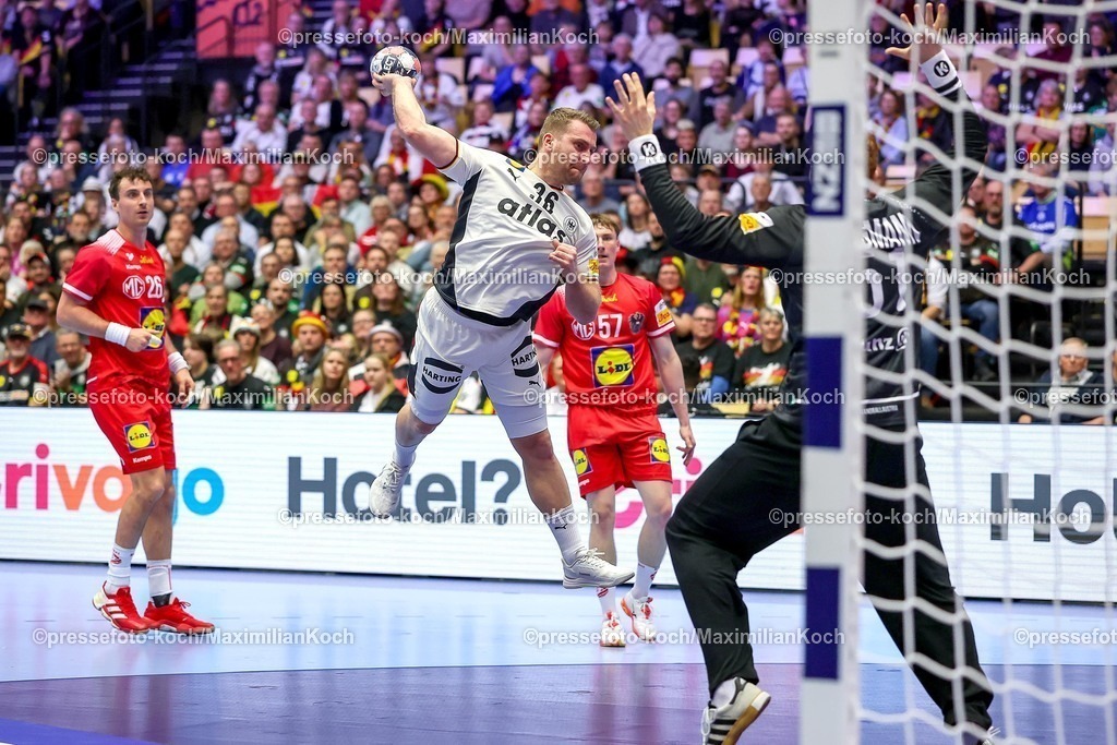 EHF15012602096 | 15.01.2026, Handball, Men's EHF EURO 2026, Deutschland - Östereich, Jyske Bank Boxen in Herning, Dänemark, Preliminary Round:  Lukas Mertens (Germany #36) wirft auf das Tor von  Leon Theodor Bergmann (Austria #51)  