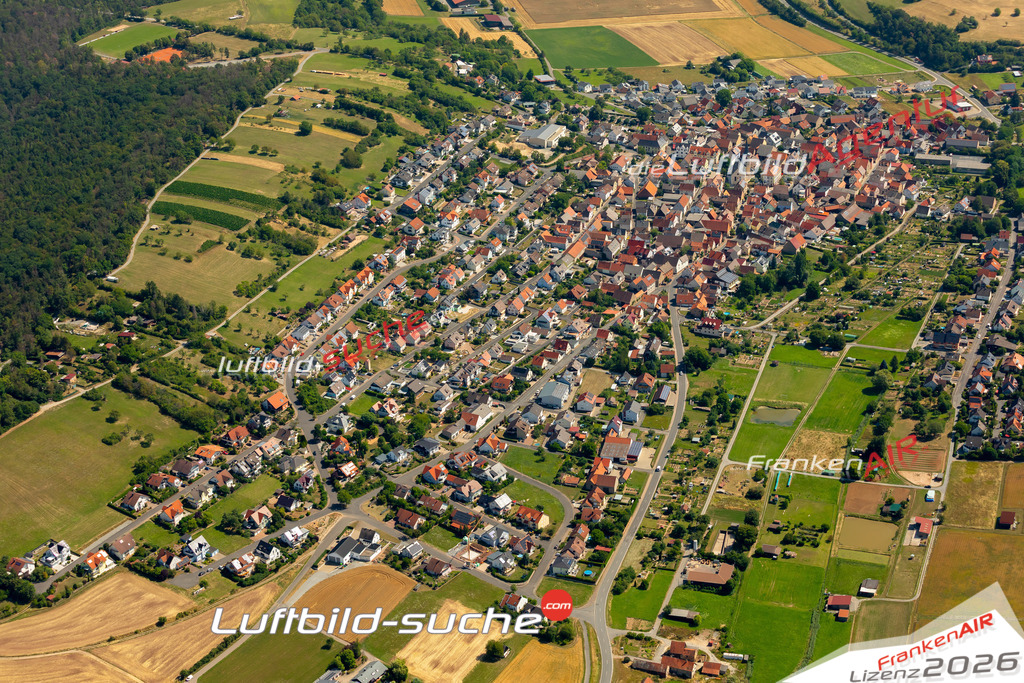 Das Luftbild zeigt :  Greußenheim - Die Luftaufnahme wurde 2023 vom UL-Flugzeug aus erstellt ( keine Drohne ) - Hochauflösende Luftaufnahme - Für grossformatige Ausdrucke geeignet. Die Geschenkidee !Mit Lizenz und Bildrechte bestellbar