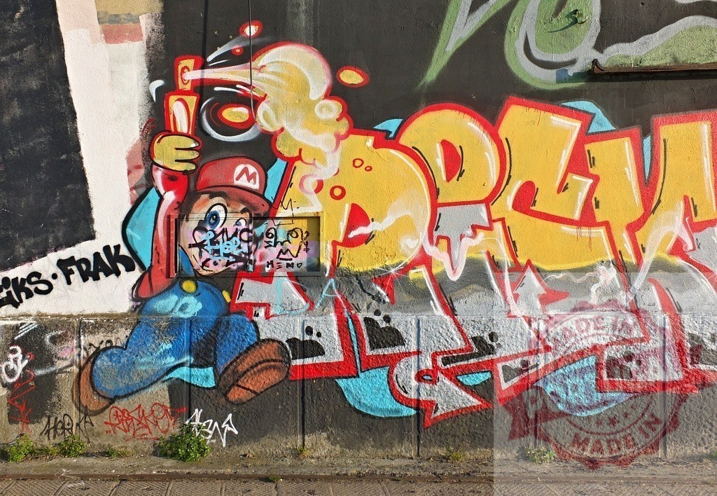 Super Mario street art graffiti wall vibrant colors | Super Mario character graffiti on a colorful urban wall representing pop culture - Realized with Pictrs.com