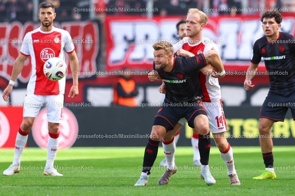 xKWIx11042601028 | 2026.04.11, xkwix, Fußball, 3.Liga, Rot-Weiss Essen -  FC Ingolstadt, Stadion an der Hafenstraße, 33.Spieltag, Saison 2025 / 2026: Lucas Brumme (Rot-Weiss Essen #14) im Zweikampf gegen Yannick Deichmann (FC Ingolstadt 04 #20) der verbissen schaut DFB regulations prohibit any use of photographs as image sequences and or quasi-video. Photo: xKamilxWilkowskixPressefotoKochx
