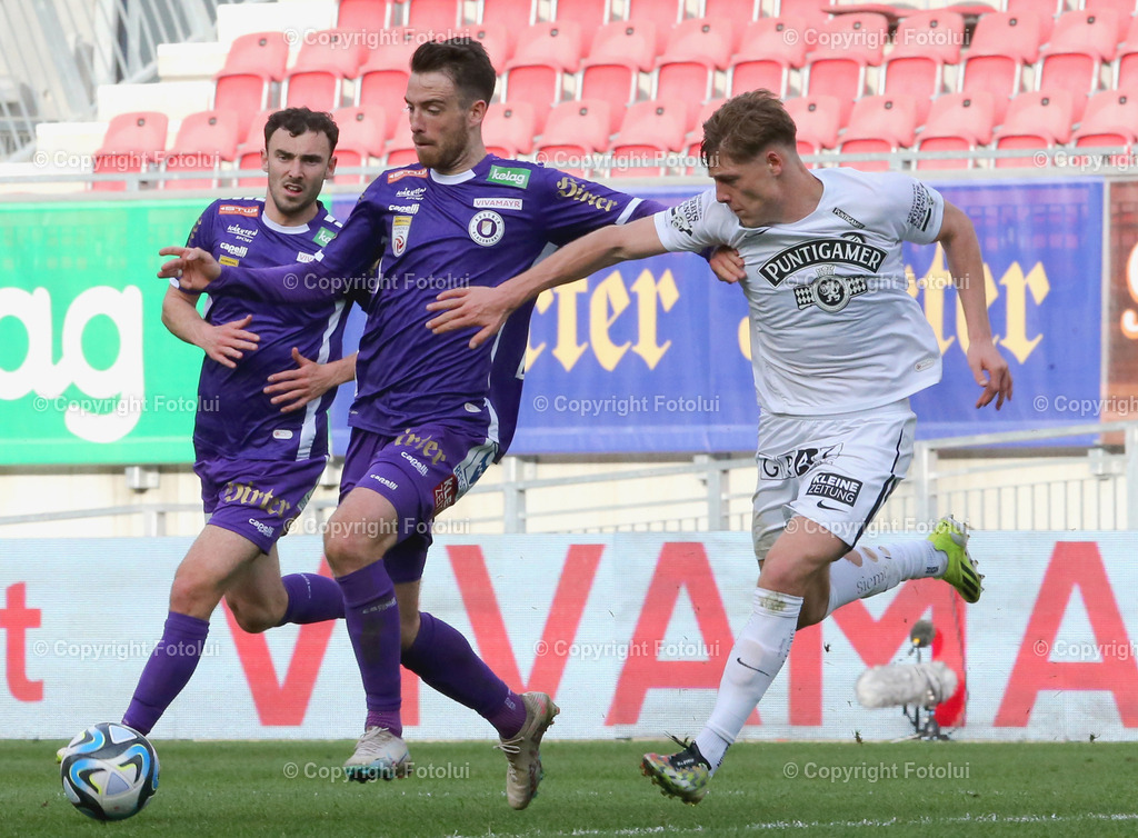 A_LUI_17032024_13 | SPORT,FUSSBALL, ADMIRAL BUNDESLIGA AUSTRIA KLAGENFURT-SK STURM GRAZ  17.03.2024 IM BILD: MAX BESCHUSKOW  (KLAGENFURT) UND ALEXANDER PRASS (STURM GRAZ) FOTO:FOTOLUI/MW