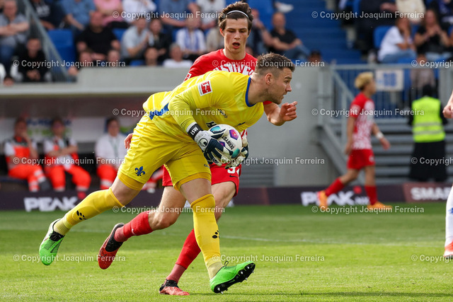 2400414_svdvsscf_2624 Kopie | Darmstadt, 14.04.2024 xjfx 1.Bundesliga SV Darmstadt 98 - SC Freiburg v.l., Goalkeeper, Torwart  Marcel Schuhen (SV Darmstadt 98), Merlin Röhl (SC Freiburg)





(DFL/DFB REGULATIONS PROHIBIT ANY USE OF PHOTOGRAPHS as IMAGE SEQUENCES and/or QUASI-VIDEO) - Realisiert mit Pictrs.com